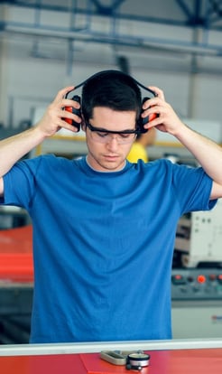 _Factory-working-wearing-noise-canceling-earmuffs